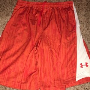 Men’s UnderArmour basketball shorts in orange